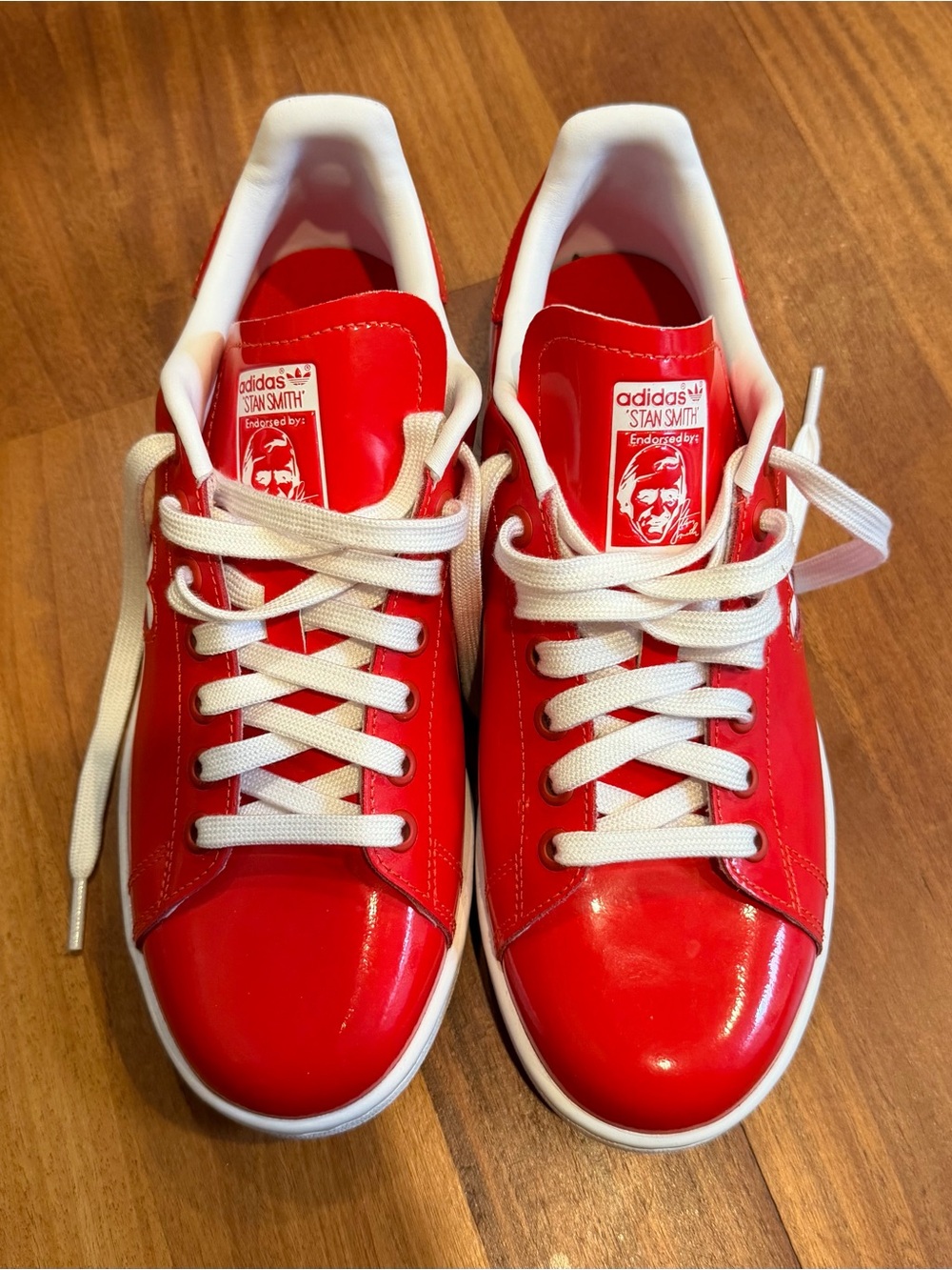 Adidas Stan Smith limited edition “love” shoes. Size 7.5 BUT fits 8.5 foot.